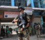 Pakistani soldiers patrol at an empty bazaar during a military operation against Taliban militants in the main town of Miranshah in North Waziristan on July 9, 2014. Last month Pakistan's military launched a long-awaited offensive in North Waziristan, aimed at wiping out longstanding militant strongholds in the area, which borders Afghanistan. More than 800,000 people have fled a major military offensive against the Taliban in a Pakistani tribal area, officials said Wednesday. AFP PHOTO/Aamir QURESHI